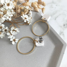 Load image into Gallery viewer, White Dangly Circular Earrings
